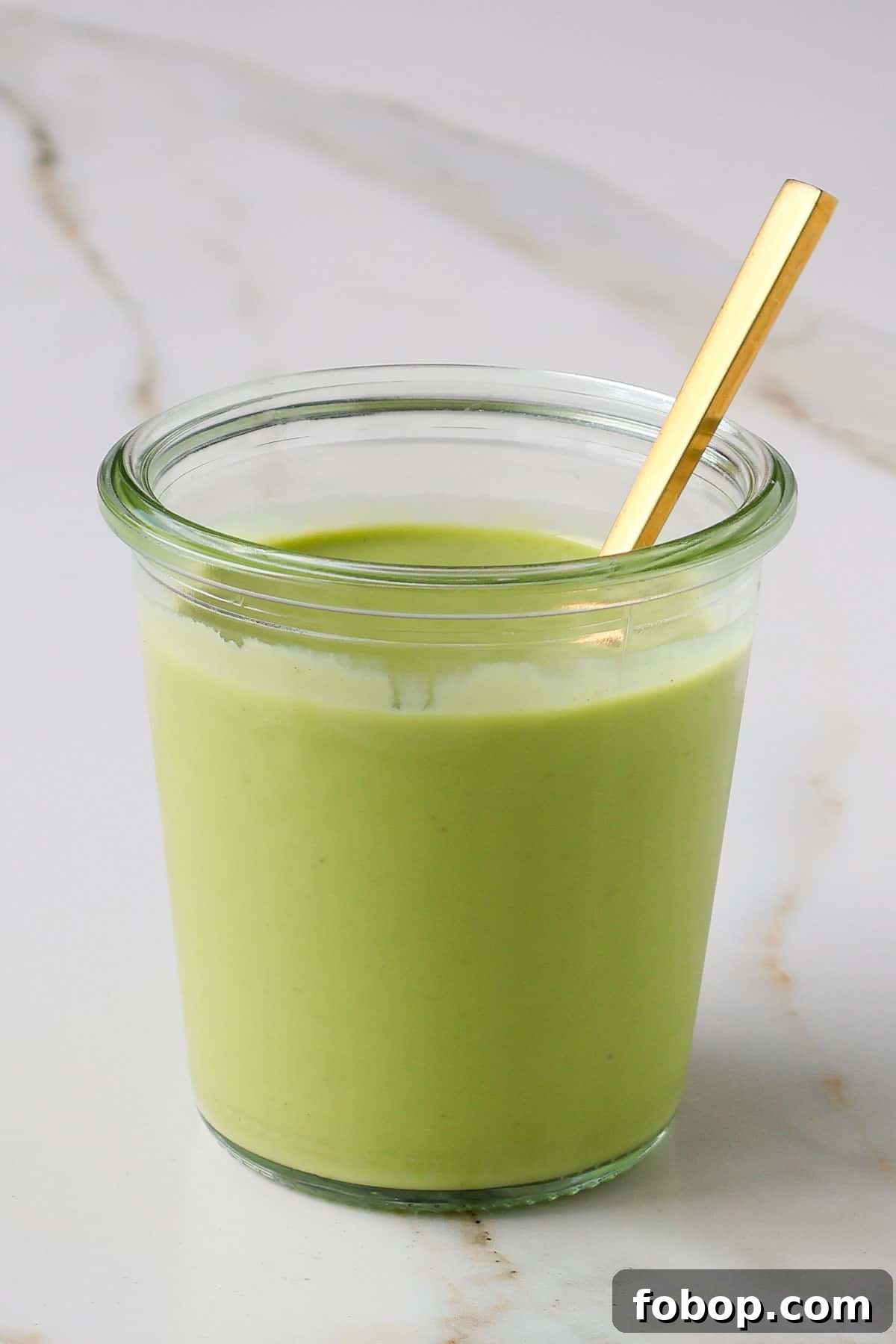 Side shot of dressing in a jar.