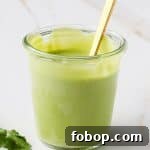 Side shot of dressing in a jar.