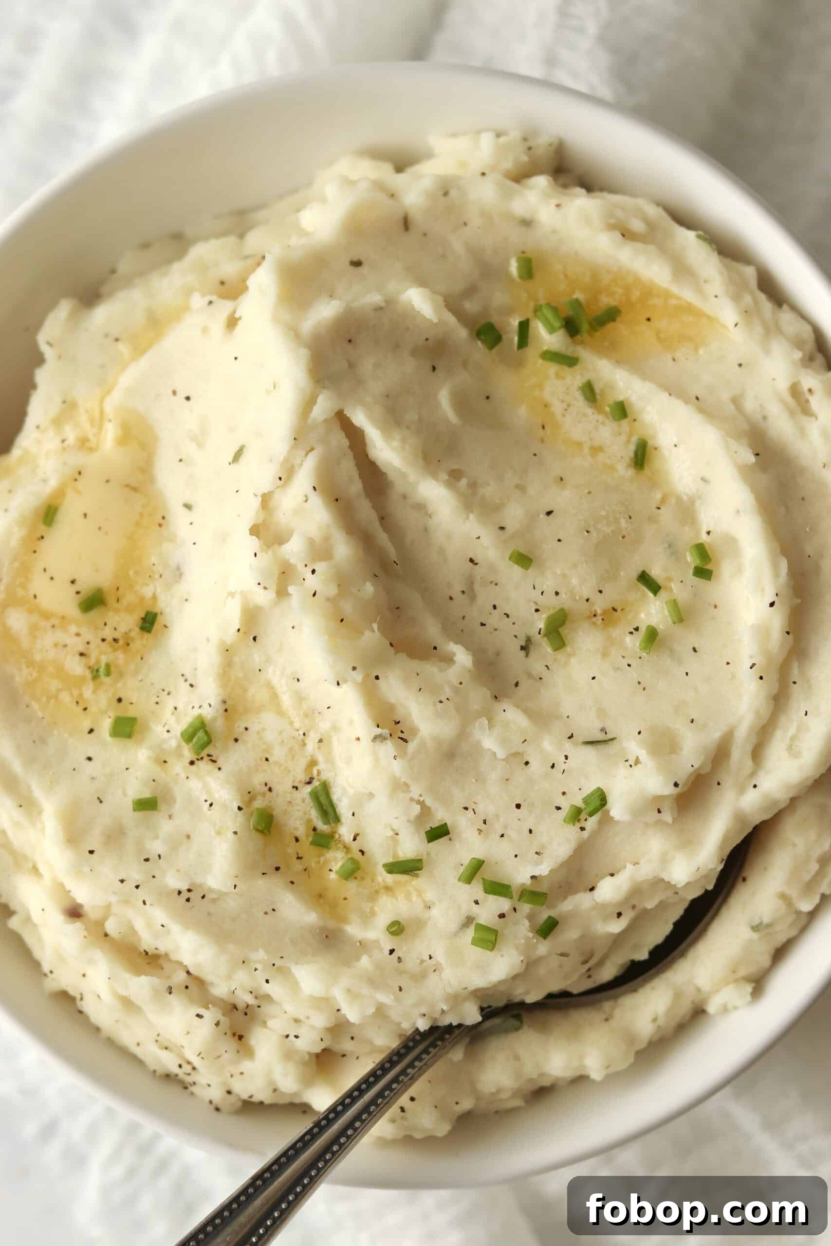 Boursin mashed potatoes topped with butter