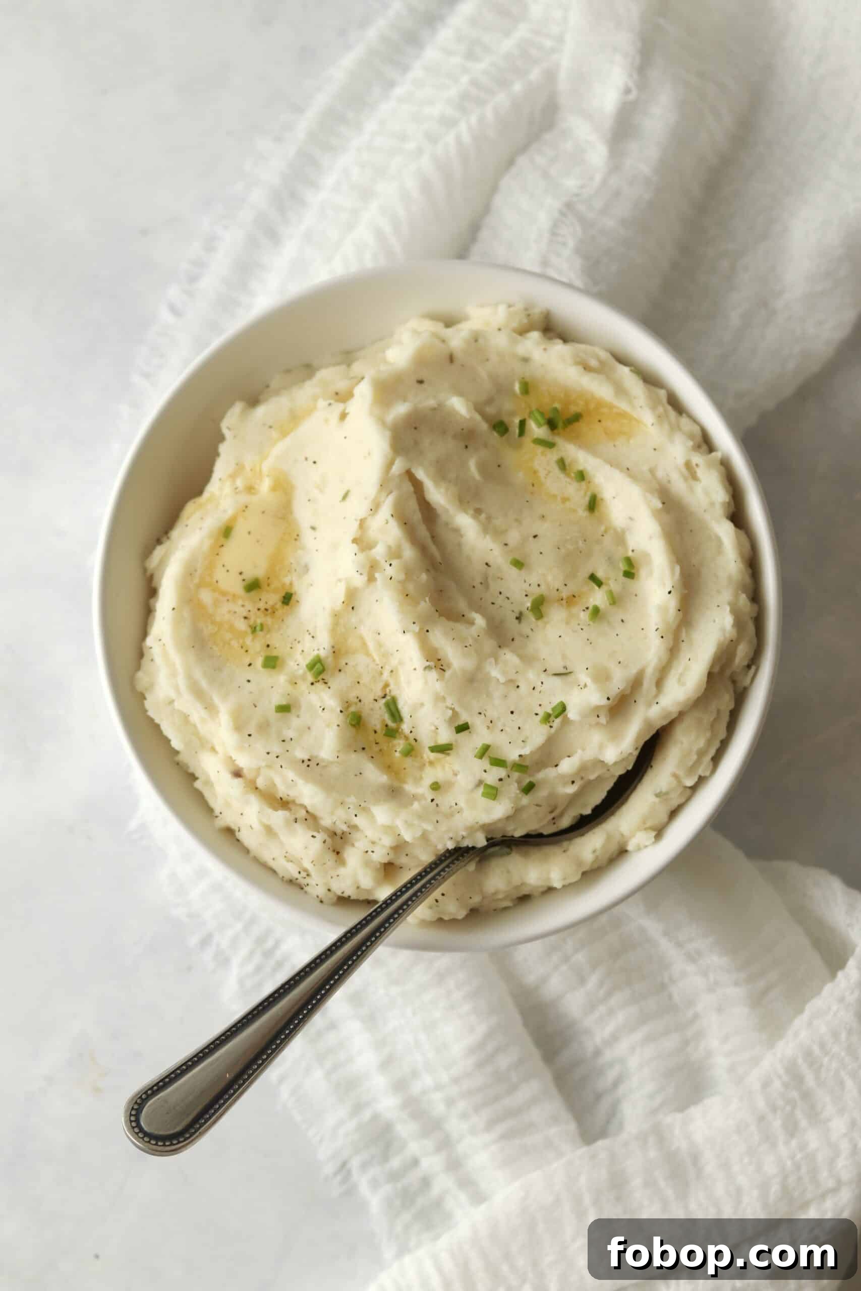 mashed potatoes made with Boursin cheese in a bowl