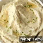 Boursin mashed potatoes topped with butter