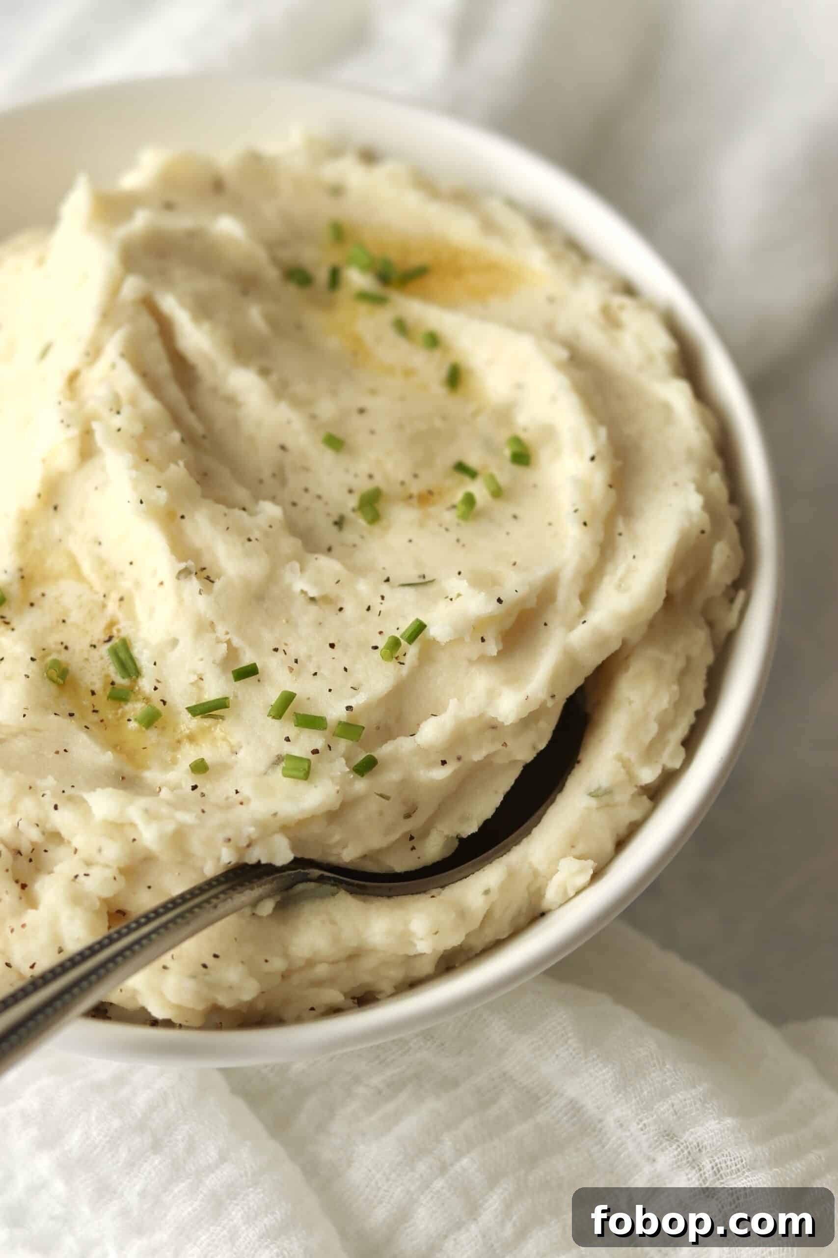 creamy Boursin cheese mashed potatoes in serving bowl