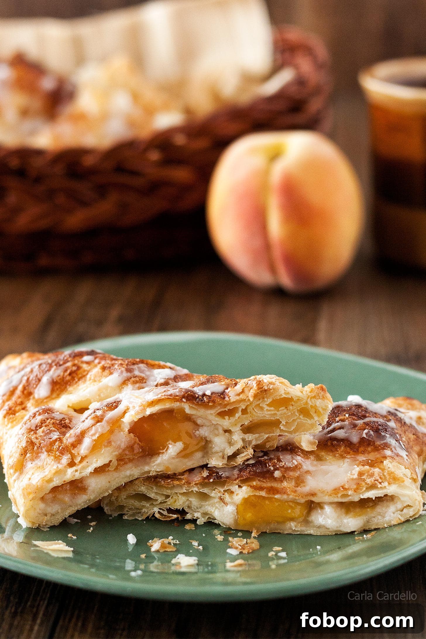 Peach Turnovers with Flaky Puff Pastry Recipe 4 Close up of peach turnover cut in half