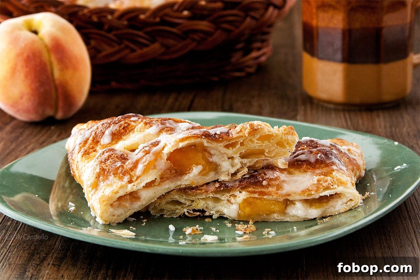 Peach Turnovers with Flaky Puff Pastry Recipe 5 Close up of peach turnovers on plate