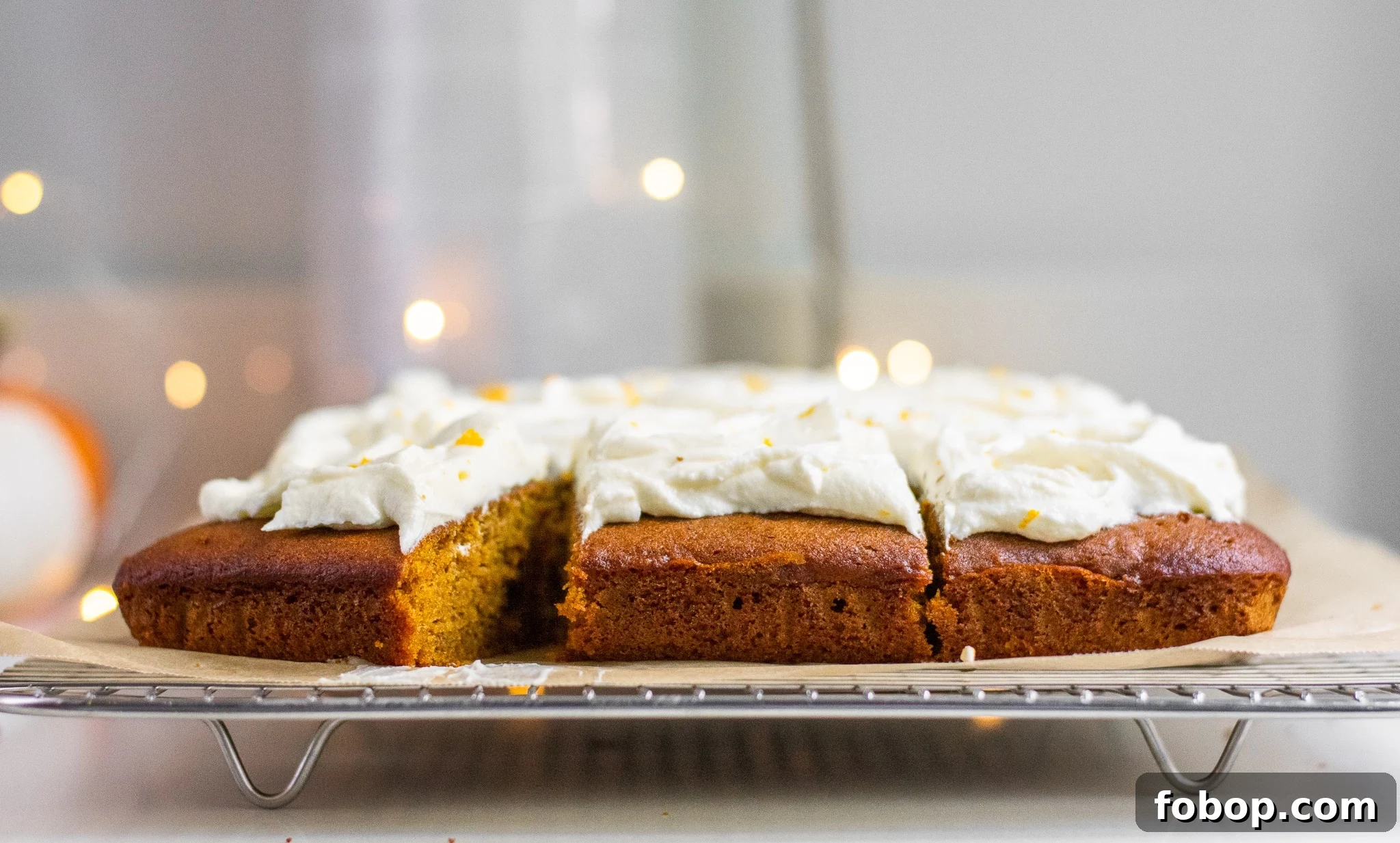 Pumpkin Cake Recipe: Moist Danish Græskarkage (Step-by-Step) 13 A slice of pumpkin cake with cream cheese frosting.