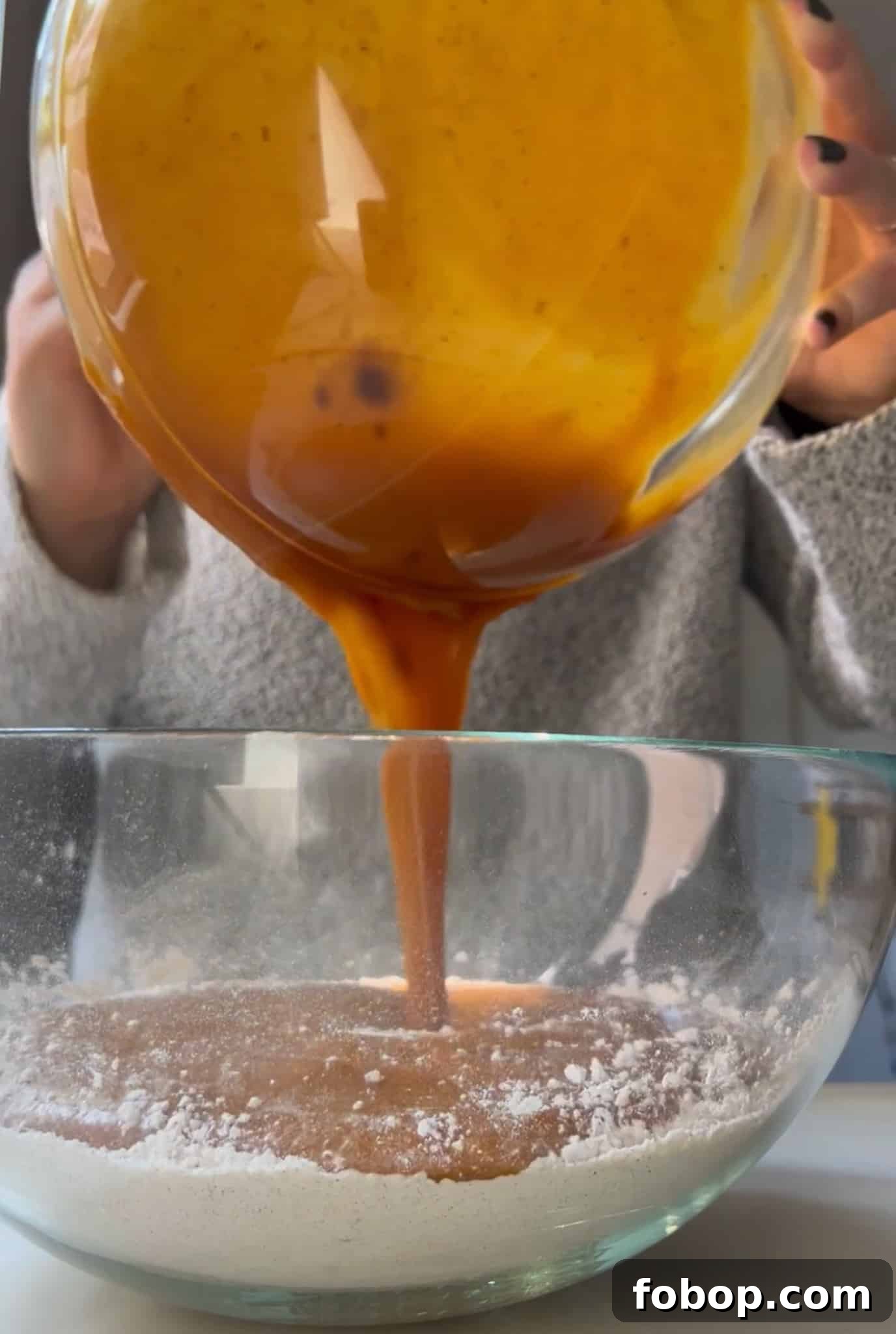 Pumpkin Cake Recipe: Moist Danish Græskarkage (Step-by-Step) 17 Mixing together wet and dry ingredients.