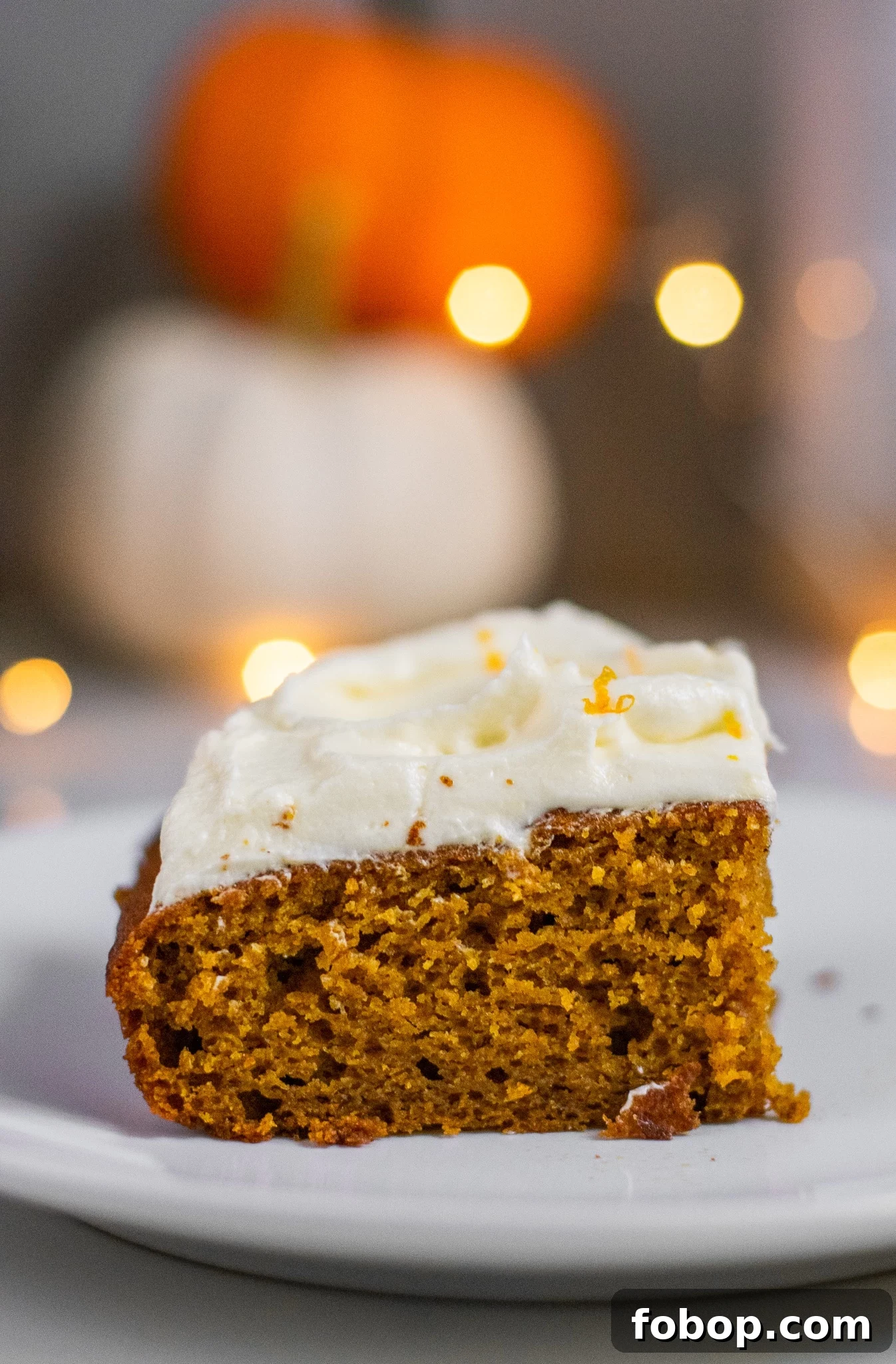 Pumpkin Cake Recipe: Moist Danish Græskarkage (Step-by-Step) 10 A slice of pumpkin cake with cream cheese frosting.