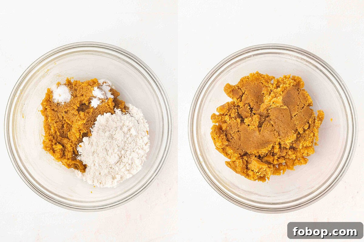 Adding the dry ingredients to peanut butter cookie dough