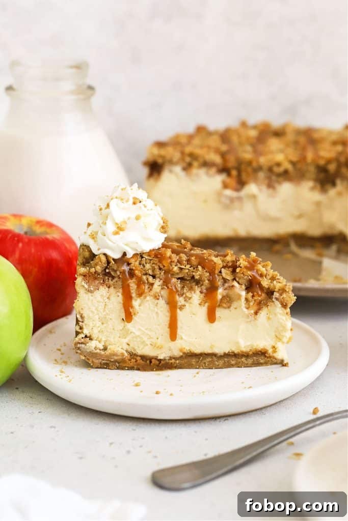 gluten-free apple crisp cheesecake drizzled with caramel