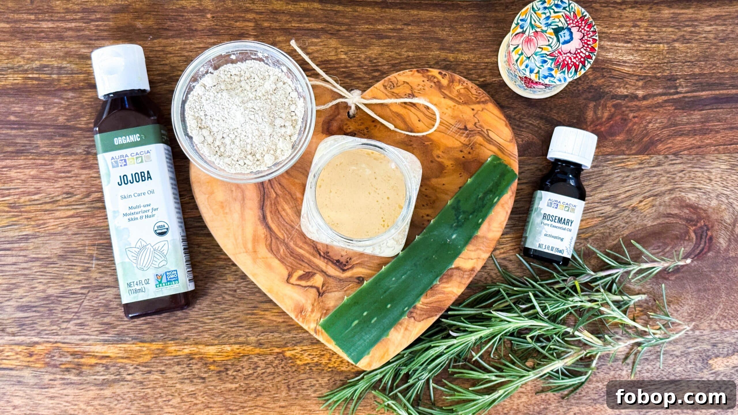 Ingredients for gentle no-scrub scalp treatment including colloidal oatmeal, aloe vera, jojoba oil, and rosemary oil