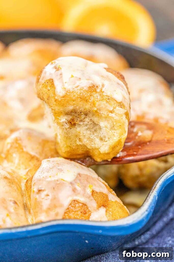 Citrus-Glazed Orange Pull-Apart Dinner Rolls 5 orange roll on a spatula