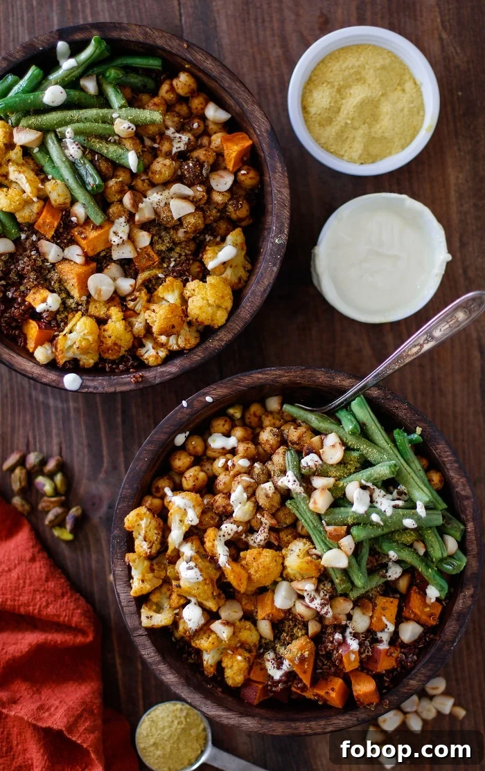 Roasted Vegetable Quinoa Bowls with Toasted Macadamia Nuts and Cashew Cream Sauce | TheRoastedRoot.net #healthy #vegetarian #vegan #glutenfree #recipe #paleo