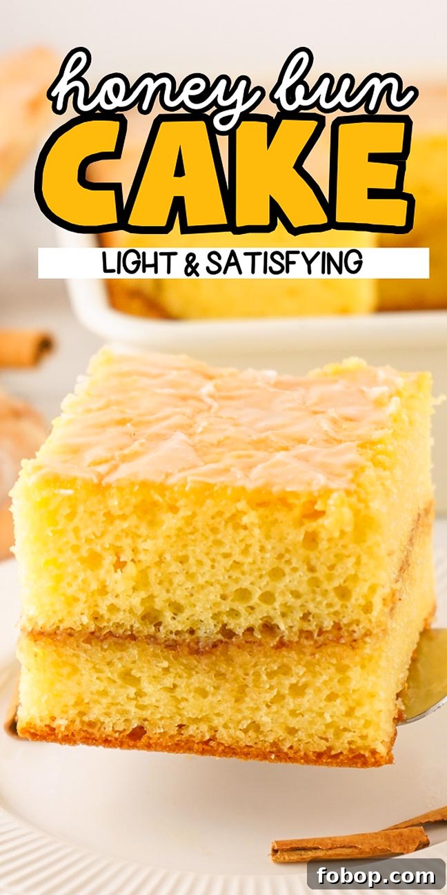 Two slices of a honey bun cake on a plate. 