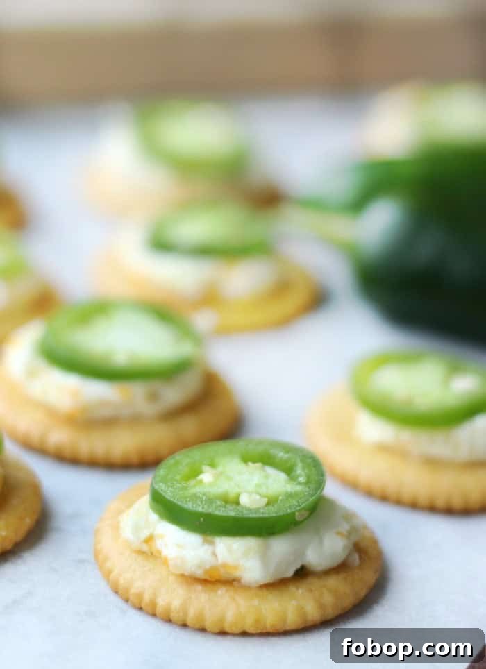 Jalapeño popper toppers on crackers