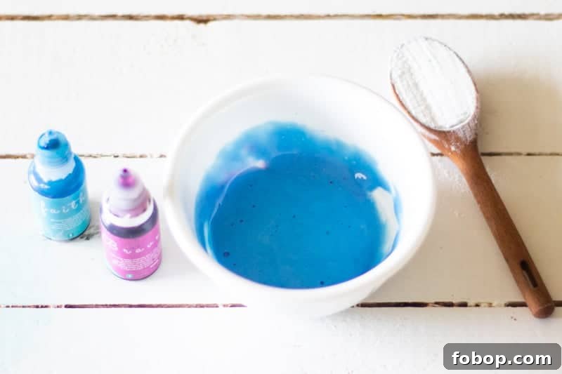 Hair toner recipe with blue and purple dye mixed with shampoo.