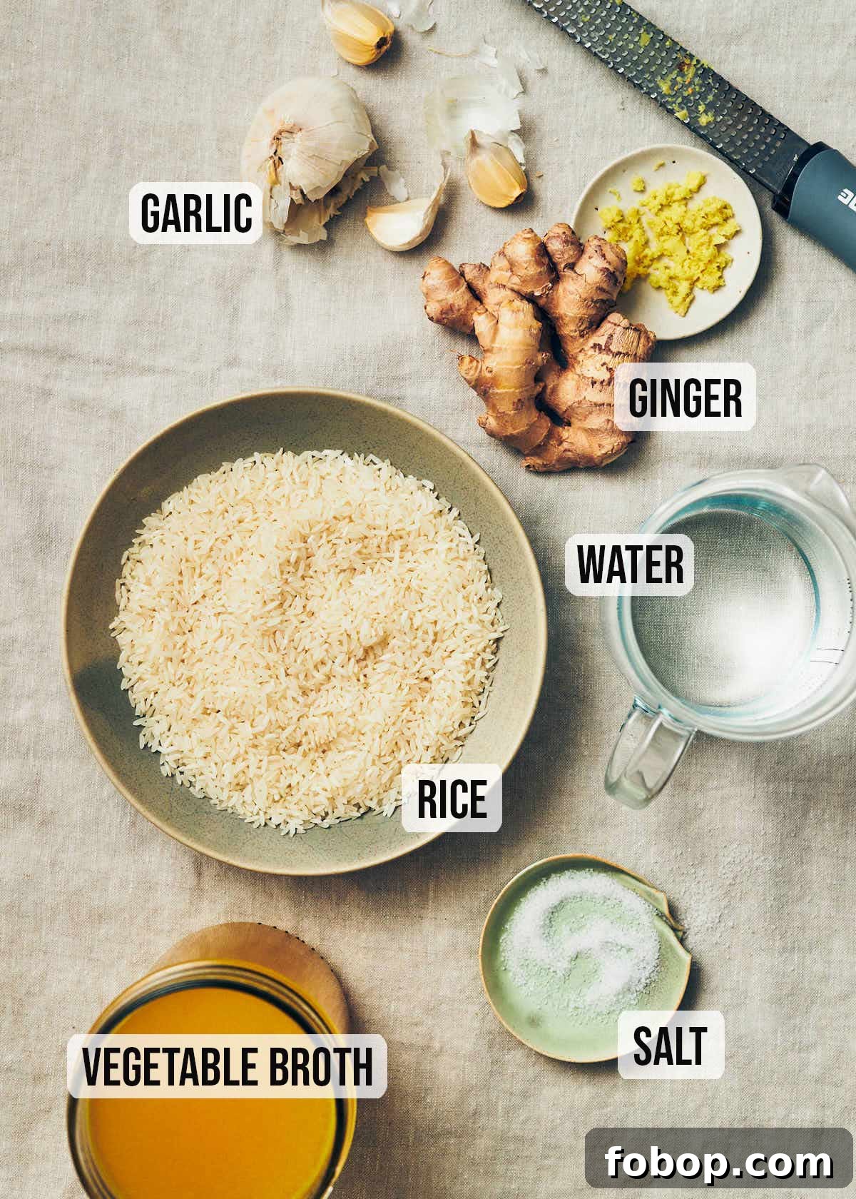 Ingredients to make vegan congee: rice, vegetable stock, water, salt, ginger, garlic.